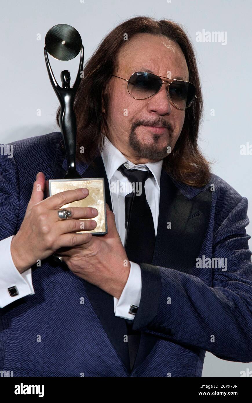 Kiss band member Ace Frehley poses with his award after the rock band was  inducted at the 29th annual Rock and Roll Hall of Fame Induction Ceremony  at the Barclays Center in