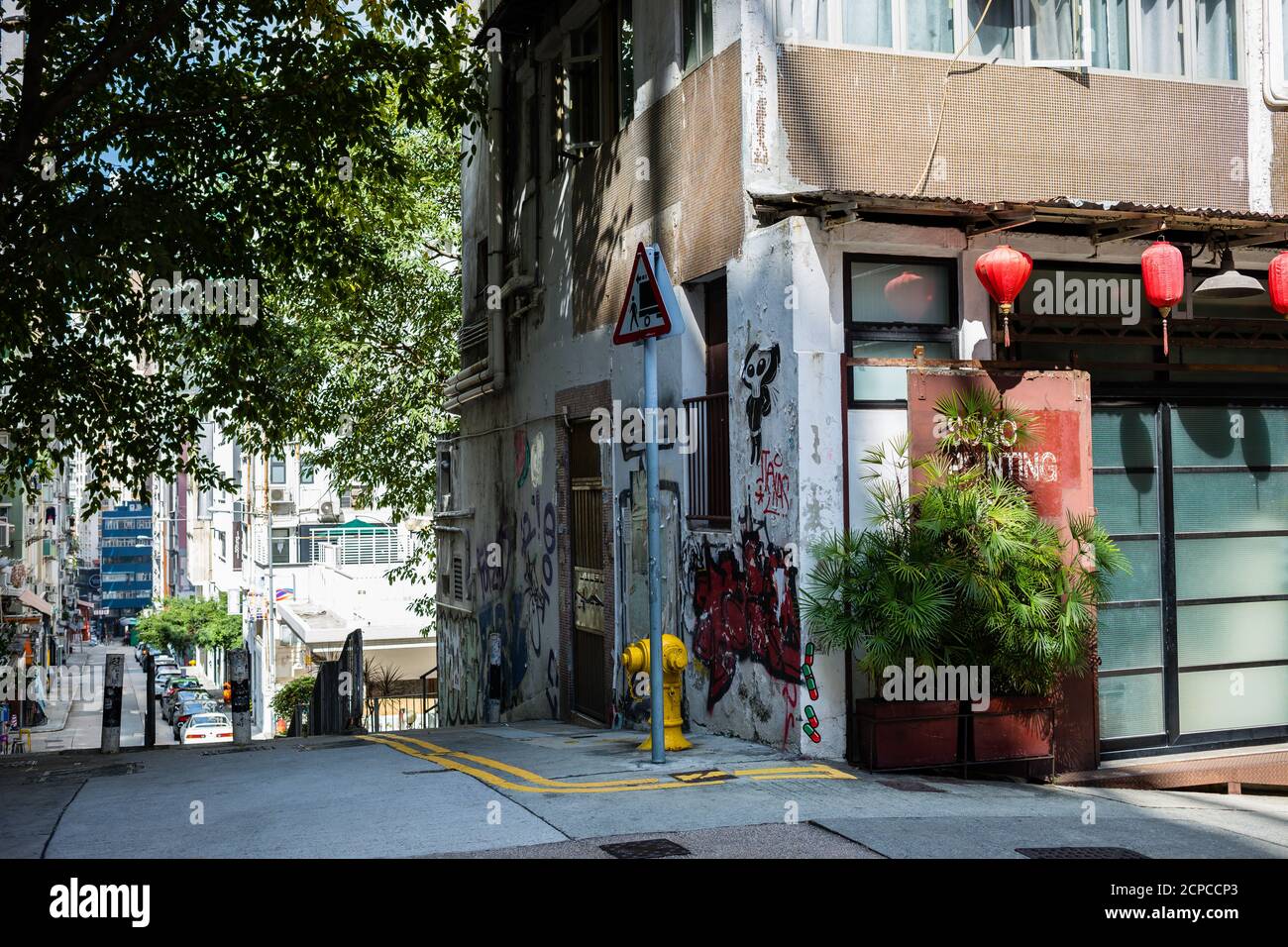 Coin d'une maison avec graffiti, Sheung WAN, Hong Kong Banque D'Images