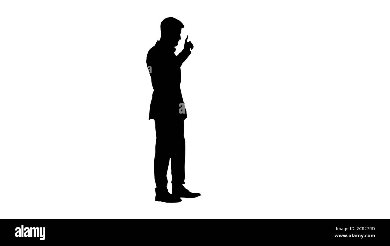 Homme d'affaires avec une barbe montrant des gestes doigt vers le haut, pouce vers le haut, Banque D'Images Homme d'affaires avec une barbe montrant des gestes doigt vers le haut, pouce vers le haut, Banque D'Images