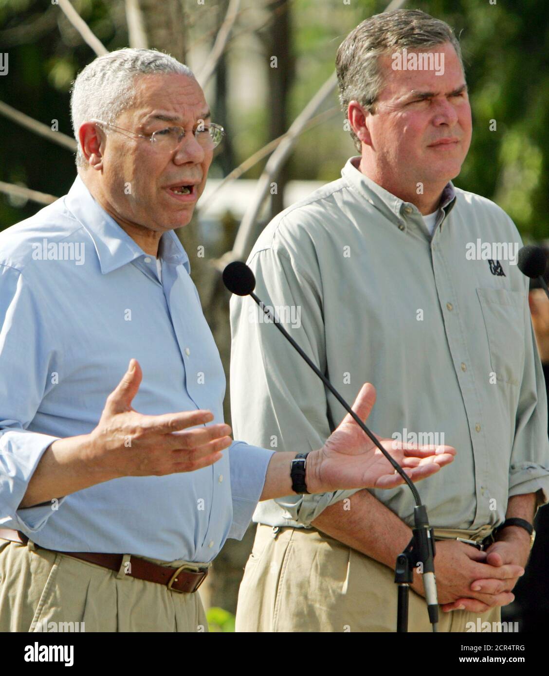 US Secretary of State Colin Powell and Florida Governor Jeb Bush attend a  news conference in tsunami-hit Phuket, Thailand. U.S. Secretary of State  Colin Powell (L) speaks as Florida Governor Jeb Bush