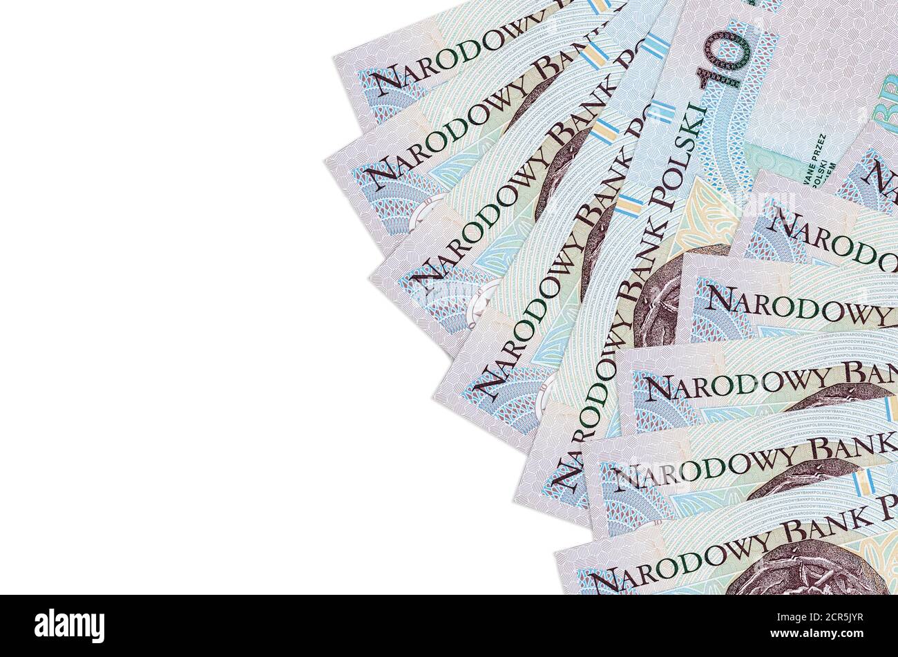 10 les billets de zloty polonais sont isolés sur fond blanc avec espace de copie. Fond conceptuel riche de la vie. Grande quantité de richesse en monnaie nationale Banque D'Images