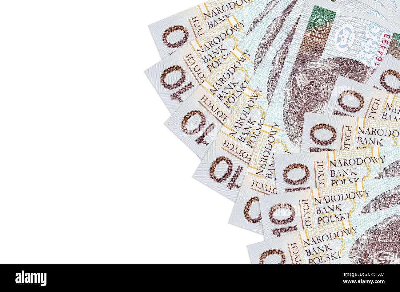 10 les billets de zloty polonais sont isolés sur fond blanc avec espace de copie. Fond conceptuel riche de la vie. Grande quantité de richesse en monnaie nationale Banque D'Images