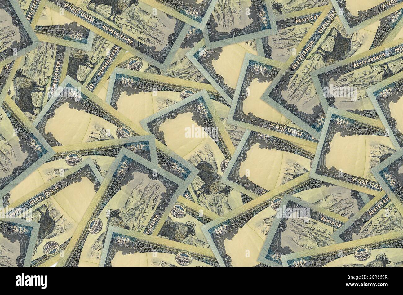 50 les bills de roupies népalaises se trouvent dans une grosse pile. Fond conceptuel riche de la vie. Beaucoup d'argent Banque D'Images