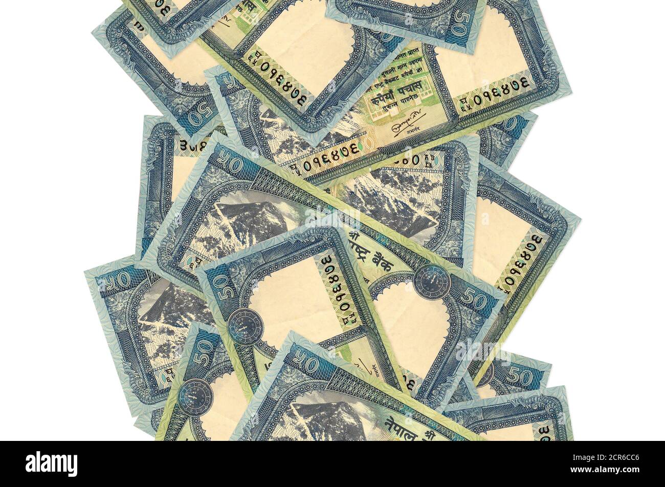 50 rupees népalaises bills volant isolé sur blanc. De nombreux billets tombant avec un espace de copie blanc à gauche et à droite Banque D'Images