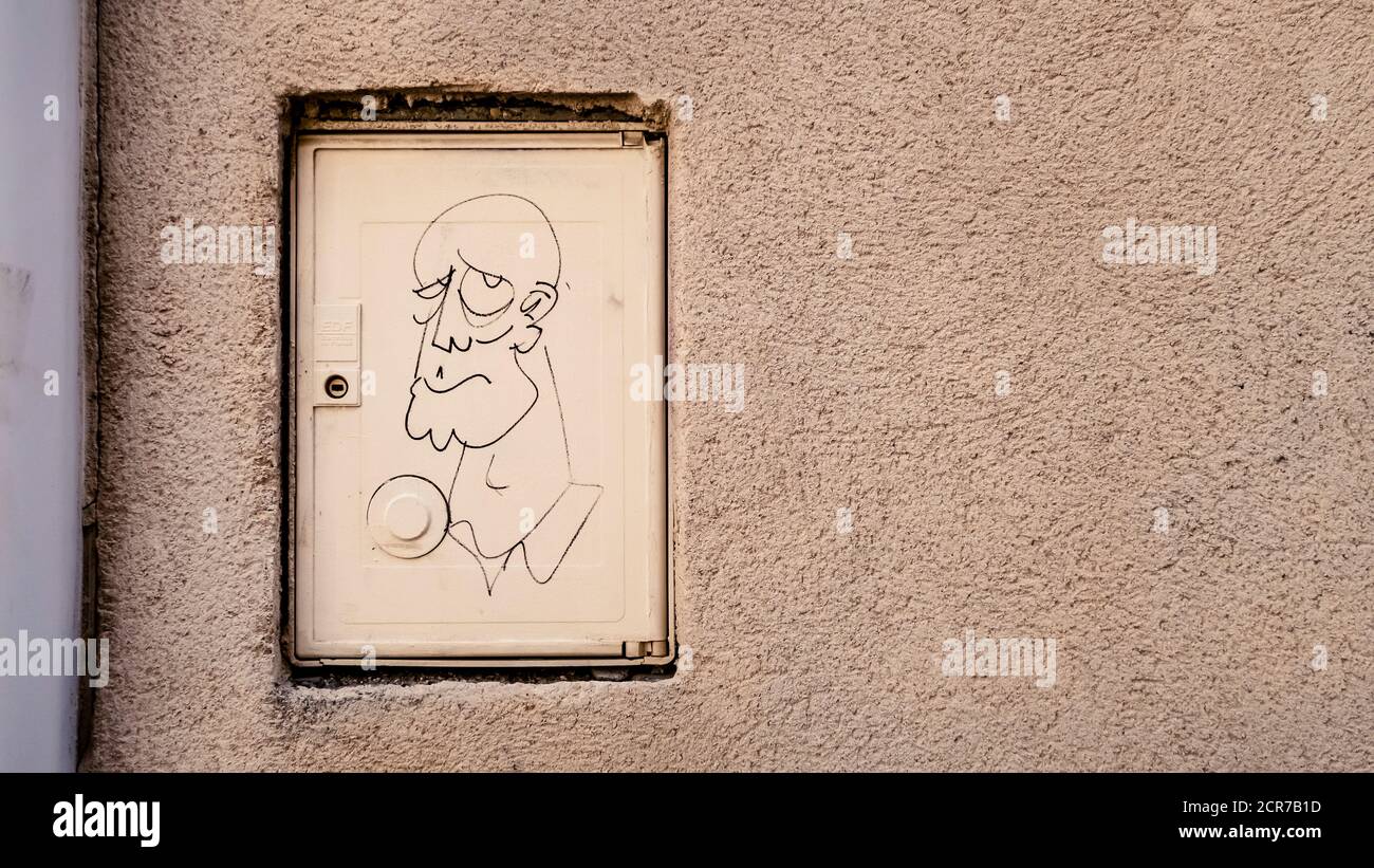 Graffiti à la tête mâle à Gruissan Banque D'Images