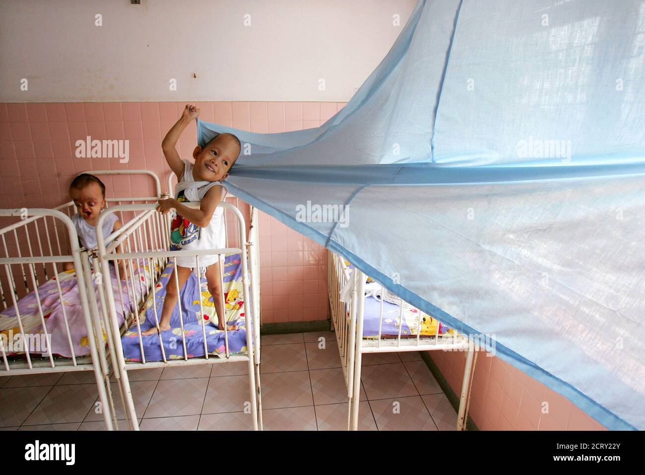 Young Vietnamese Disabled Victims Of Agent Orange Play In Their Cots In A Ho Chi Minh City Hospital February 25 05 On Monday A New York Court Will Begin Hearing A Lawsuit Young Vietnamese Disabled Victims Of Agent Orange Play In Their Cots In A Ho Chi Minh City Hospital February 25 05 On Monday A New York Court Will Begin Hearing A Lawsuit