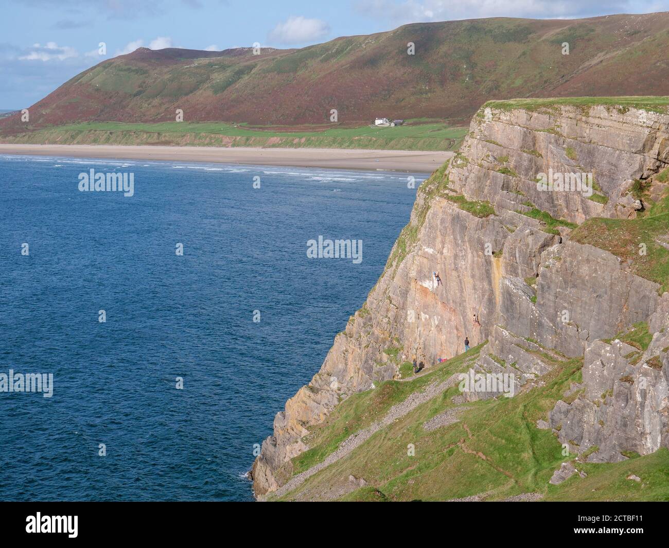 L'ancien presbytère une maison d'islamolation dans le paysage et plage à Rhossili Beach sur la Gower Peninsula Wales Royaume-Uni Banque D'Images