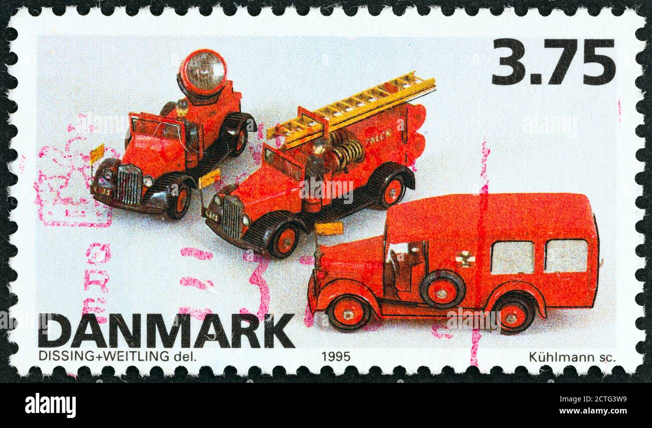 DANEMARK - VERS 1995 : un timbre imprimé au Danemark à partir du numéro « Danish Toys » montre les modèles de véhicules TEKNO, vers 1995. Banque D'Images