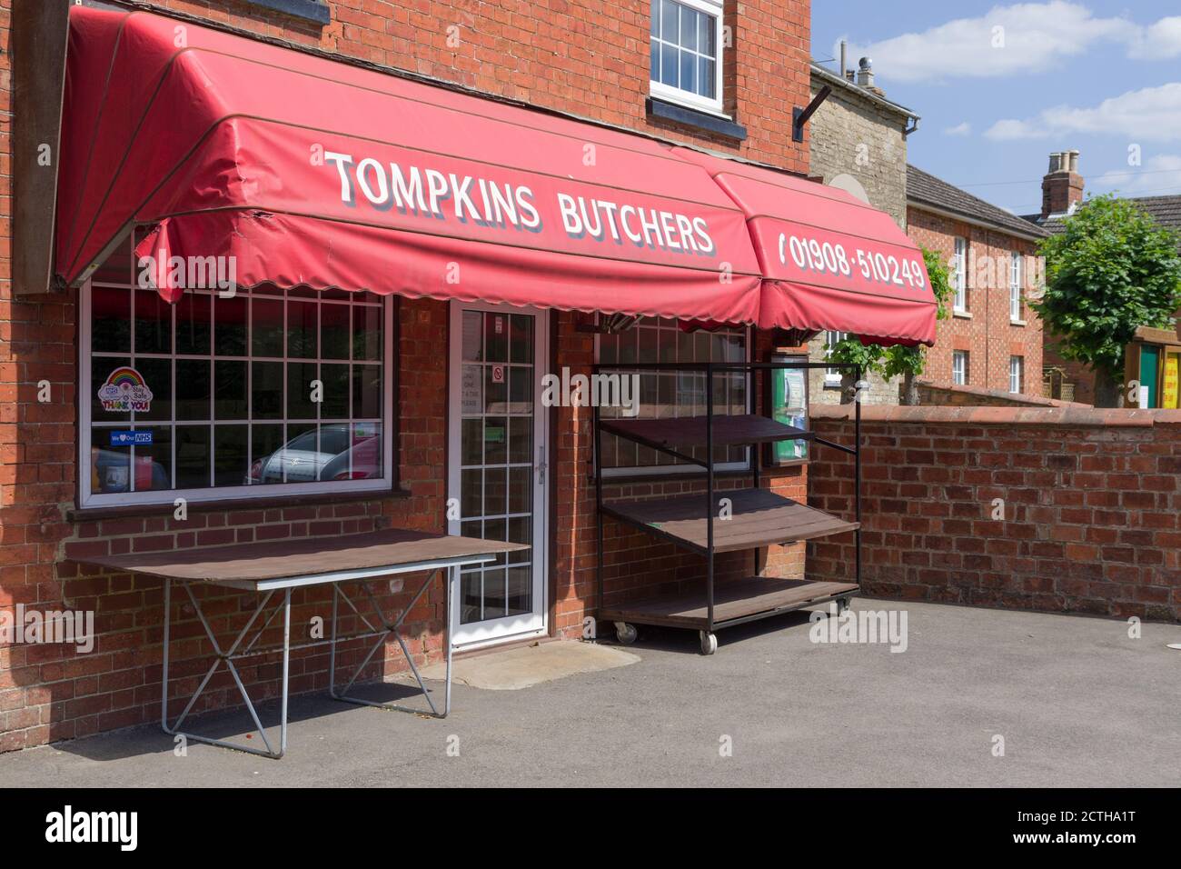 Tompkins Butchers, une boucherie traditionnelle dans le village de Hanslope, Buckinghamshire, Royaume-Uni Banque D'Images