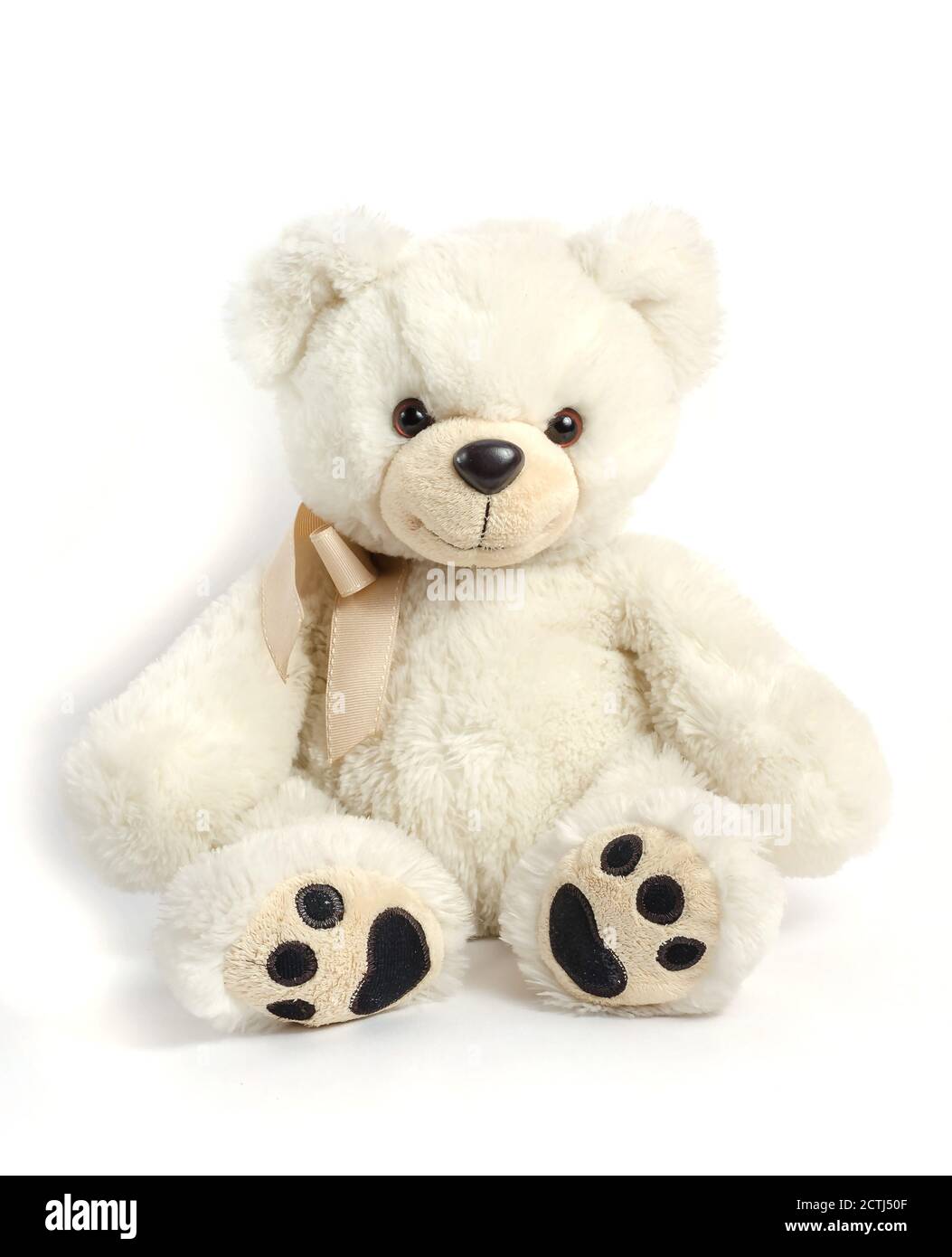 Jouet pour enfants - ours en peluche blanc sur fond blanc Banque D'Images