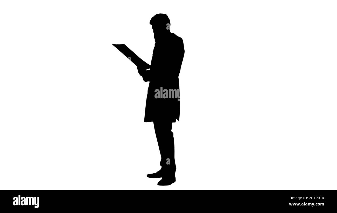 Silhouette concentrée homme médecin regardant la tomograp calculé Banque D'Images