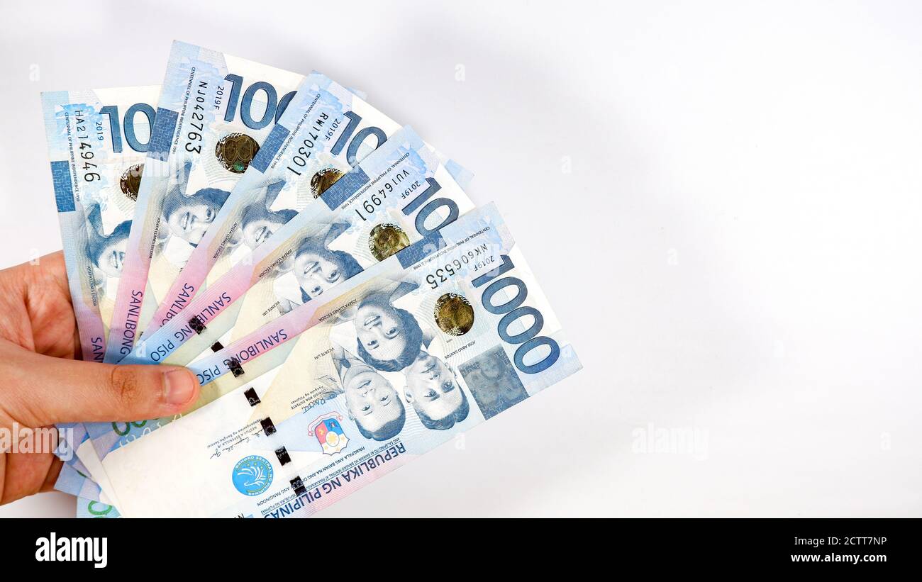 Le peso philippin est sur fond blanc Banque D'Images