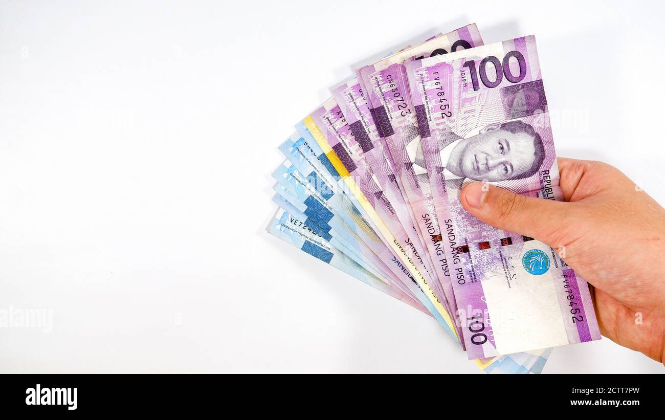 Le peso philippin est sur fond blanc Banque D'Images