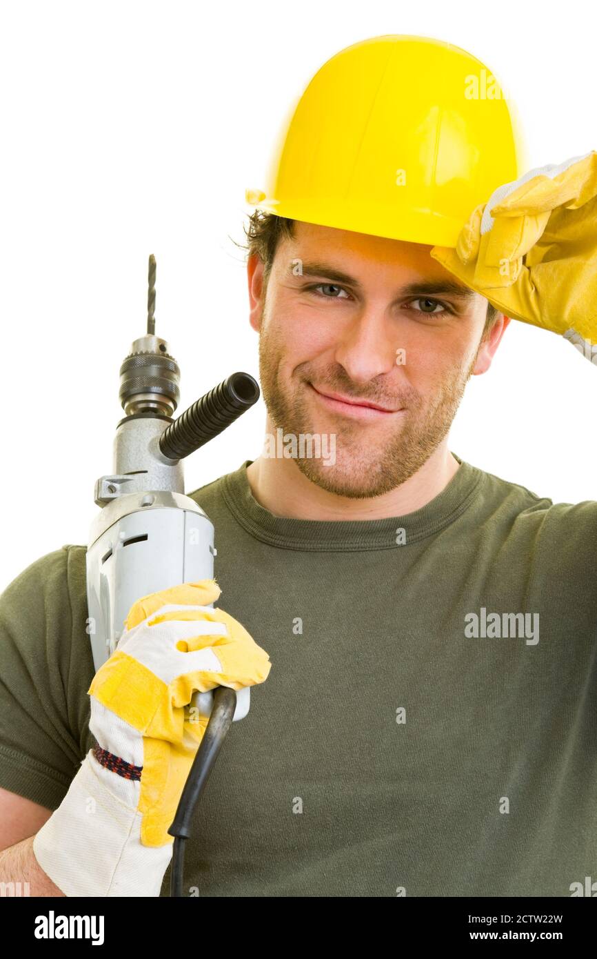 Ouvrier de construction avec casque et perceuse Banque D'Images
