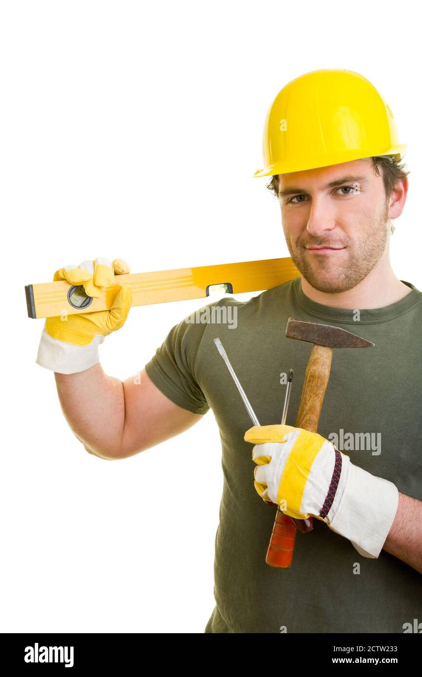 Ouvrier de construction avec casque, niveau à bulle, marteau et tournevis Banque D'Images