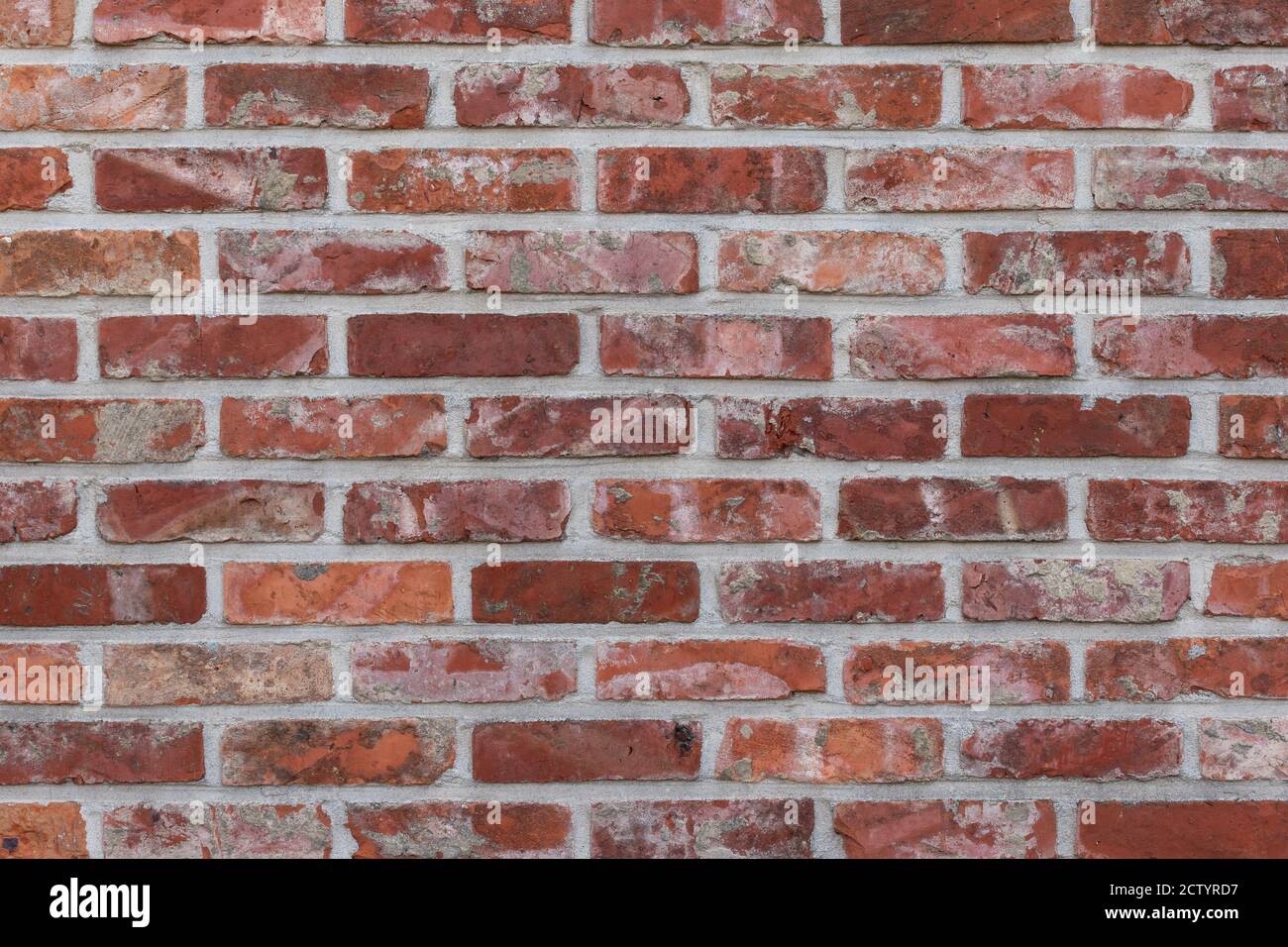 Mur rouge en brique ancienne. Banque D'Images