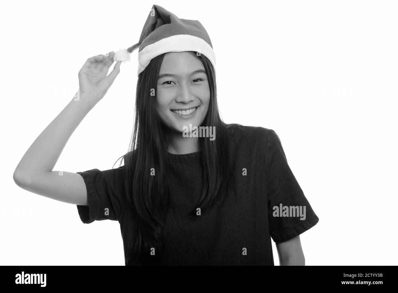 Les jeunes professionnels Asian teenage girl smiling prêt pour Noël Banque D'Images