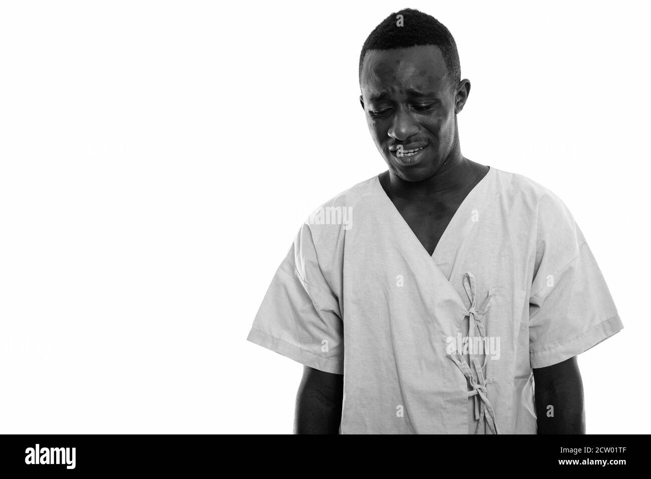 Portrait de jeune homme de l'Afrique noire et triste à pleurer patient Banque D'Images