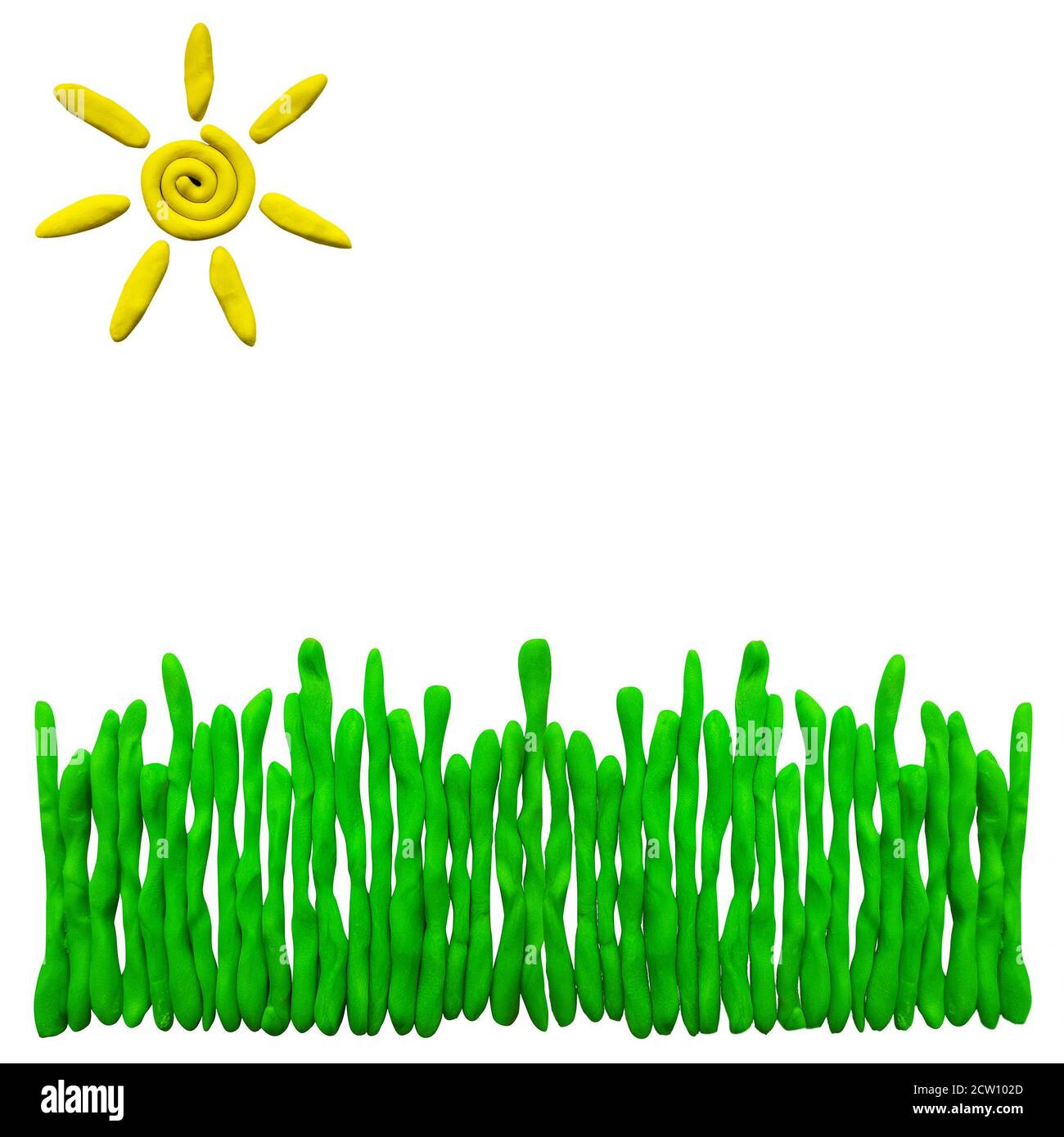 Présence d'herbe et de soleil colorés en plasticité isolée sur fond blanc Banque D'Images