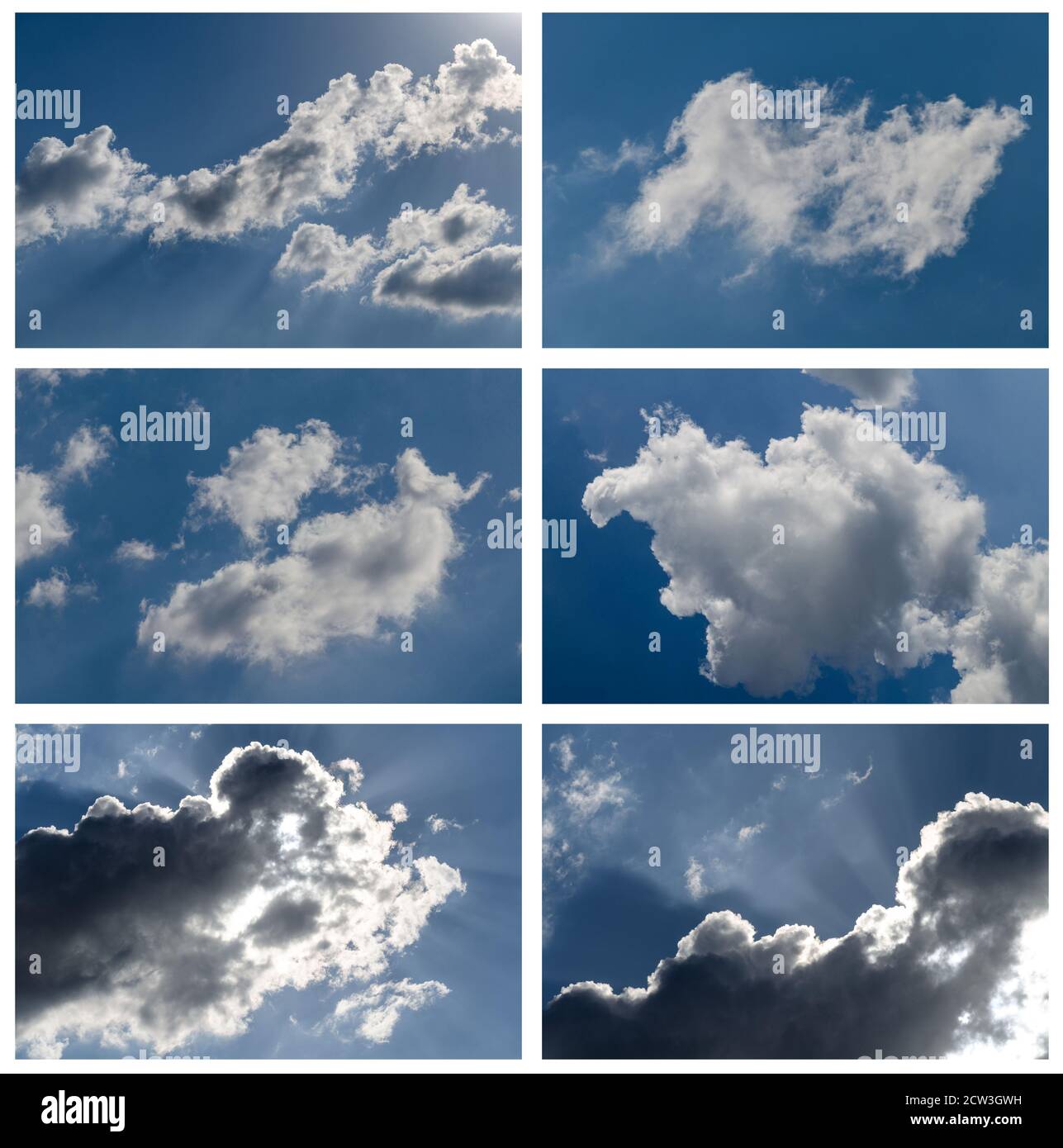 Ensemble de nuages blancs sur fond bleu dans le jour Banque D'Images