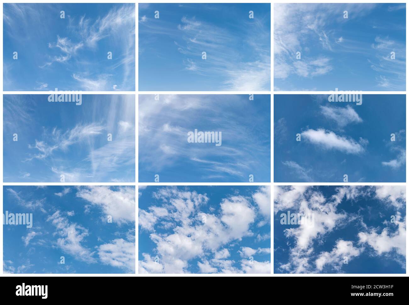 Ensemble de nuages blancs sur fond bleu dans le jour Banque D'Images
