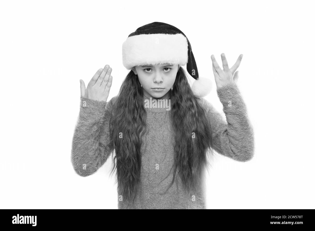 Triste Noël pour enfants de mauvaise humeur. Nouvel an. Joyeux Noël et Nouvel An vacances. enfant la veille de Noël. Maison de vacances de Noël. small santa fond blanc. joyeux noël. Où sont mes cadeaux. Banque D'Images