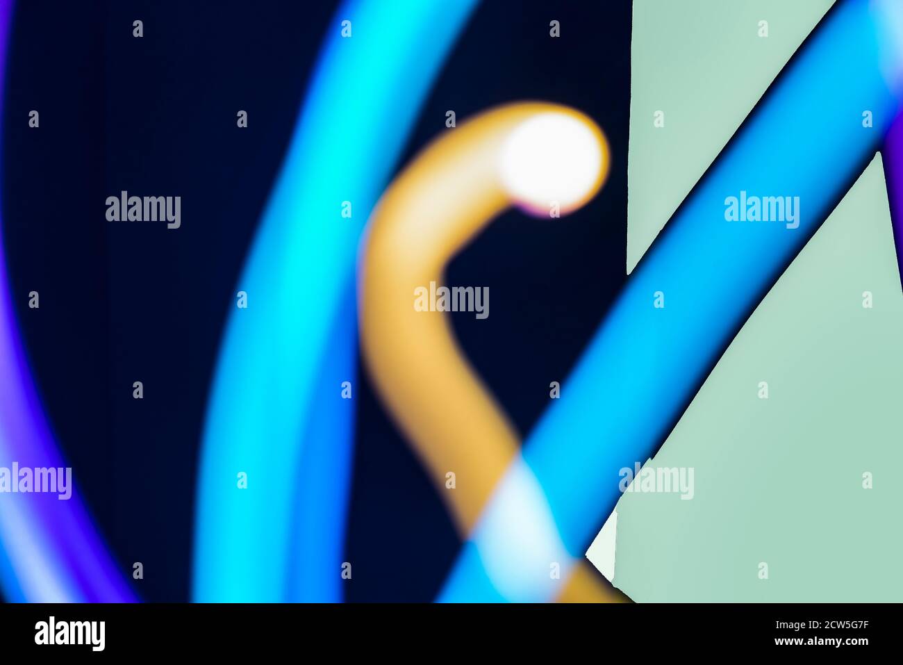 Arrière-plan abstrait flou coloré de mouvements tubes lumières Banque D'Images