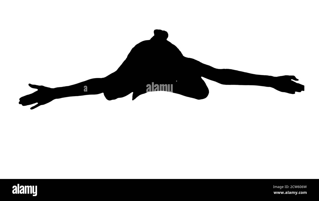 Silhouette femme assise dans une posture de lotus et regardant vers l'appareil photo. Banque D'Images