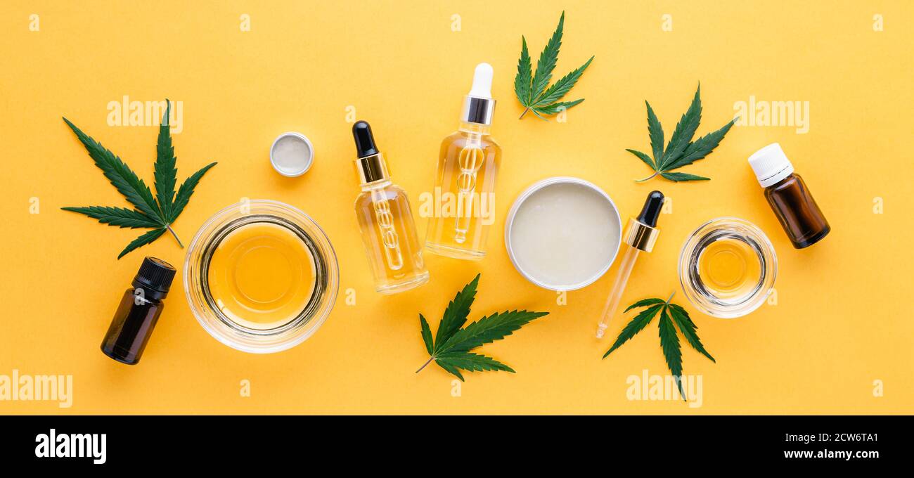 Huile de CBD, teinture de chanvre, produit cosmétique de cannabis pour les soins de la peau. Médecine alternative, cannabis médical pharmaceutique. Variétés de chanvre essentielles Banque D'Images