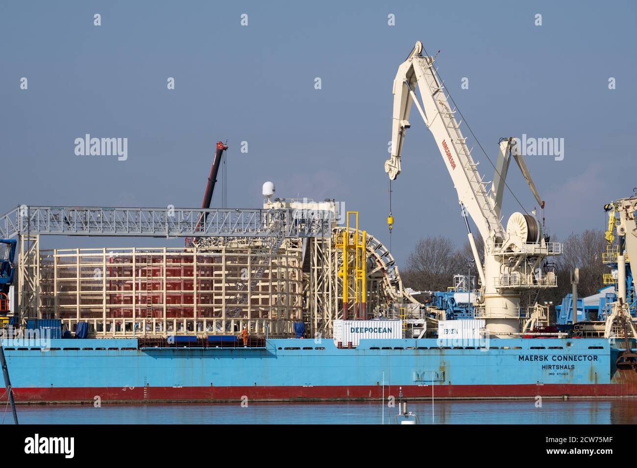 Récipient de pose de câble de connecteur Maersk. Le navire est amarré dans le port de Blyth, sur la côte de Northumberland. Banque D'Images