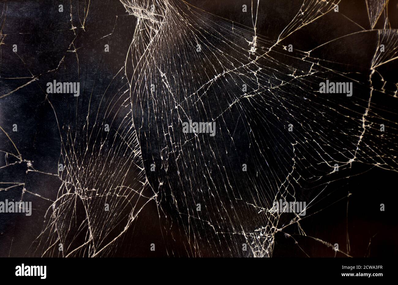 La texture de l'écran noir du smartphone est cassée. Banque D'Images