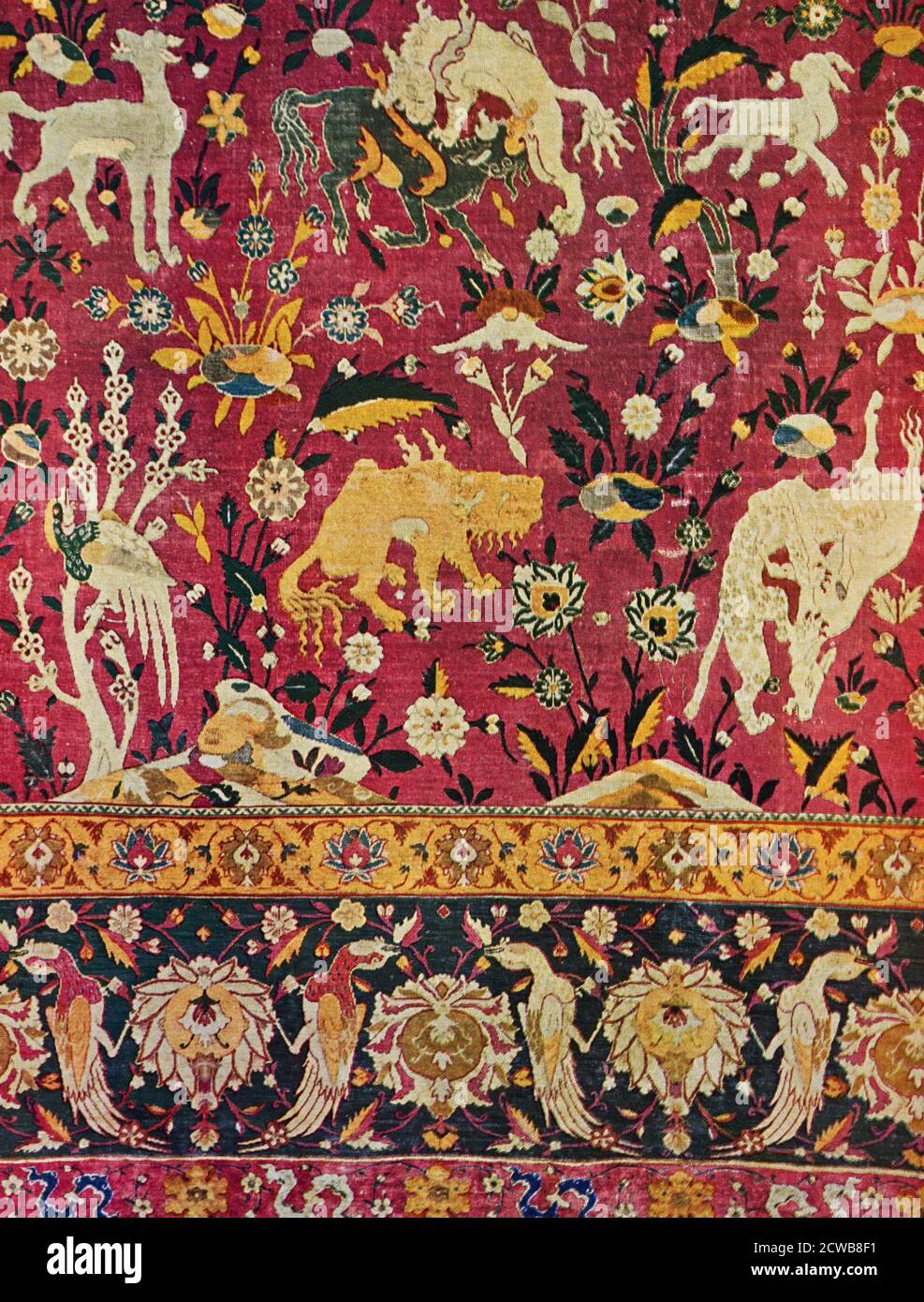 Tapis persan en soie avec détails animaux de l'époque safavide. Banque D'Images
