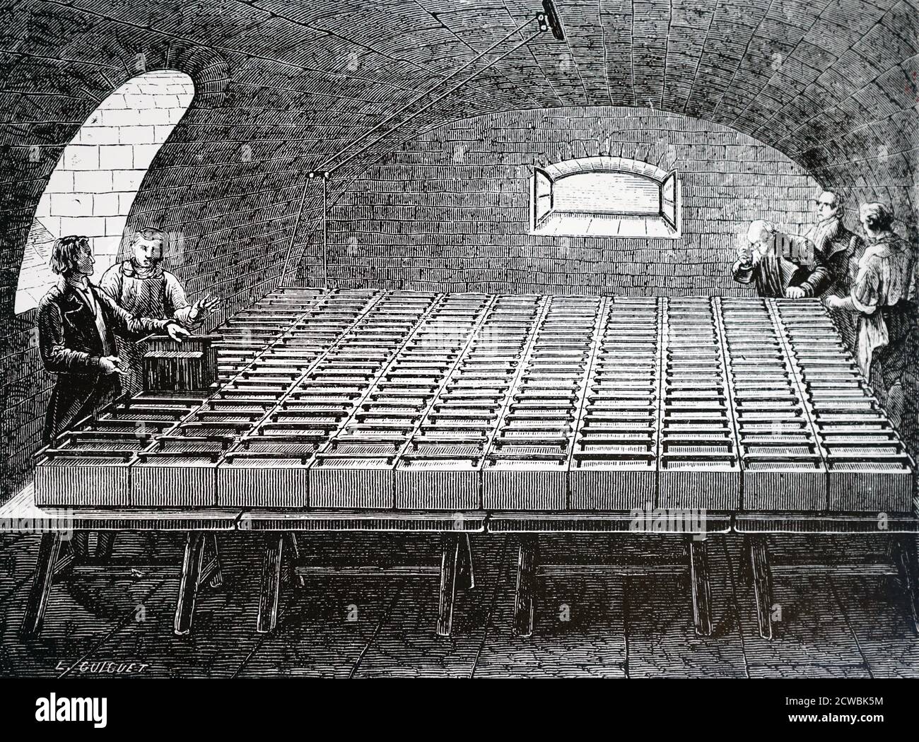 Gravure représentant la batterie géante construite au sous-sol de la Royal institution, Londres, par Humphry Davy. La batterie était composée de 200 piles de Wollaston. Banque D'Images