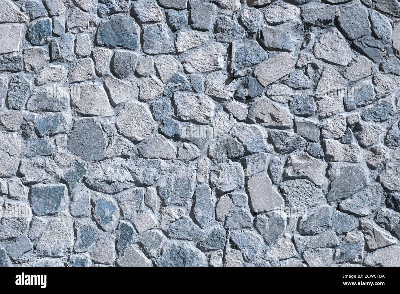 Un mur inhabituel de bleu de pierre sauvage. Arrière-plan. Photo de haute qualité Banque D'Images