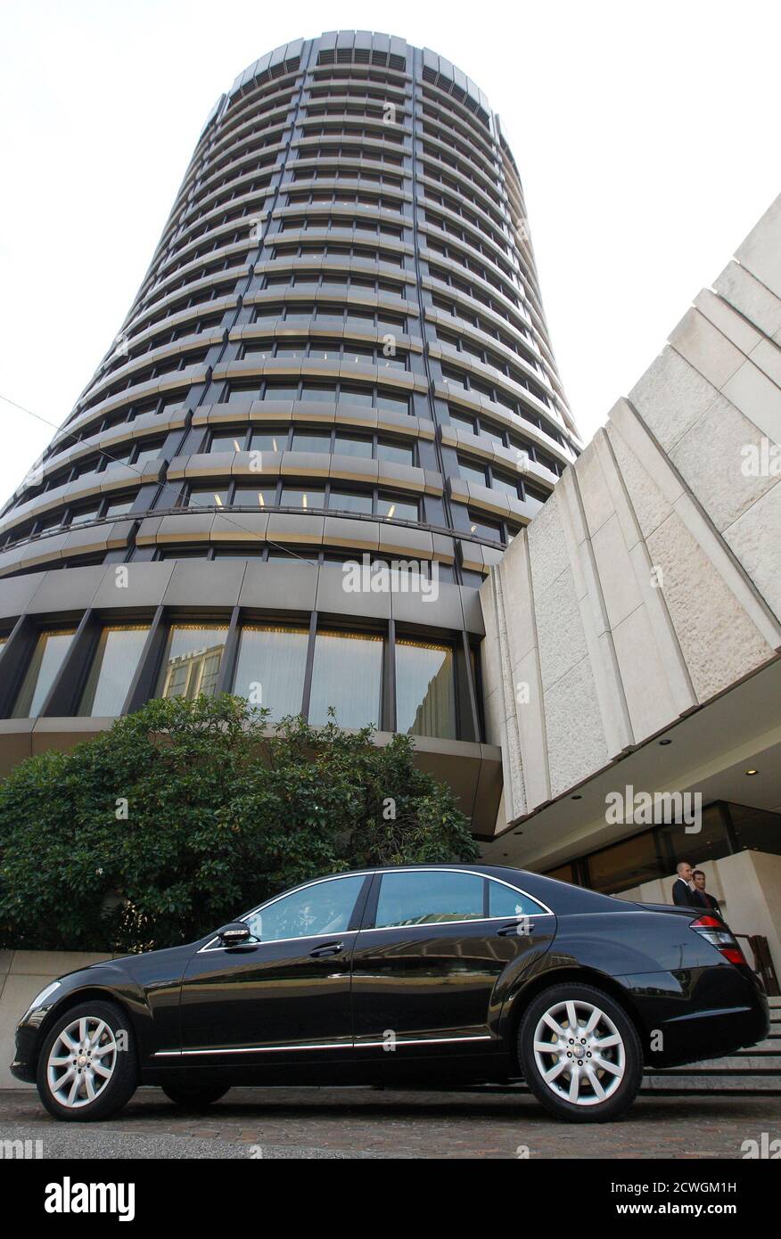 A car is seen parked in front of the headquarters of the Bank for  International Settlements (BIS) in Basel September 14, 2010. New capital  rules, called Basel III, set by global regulators