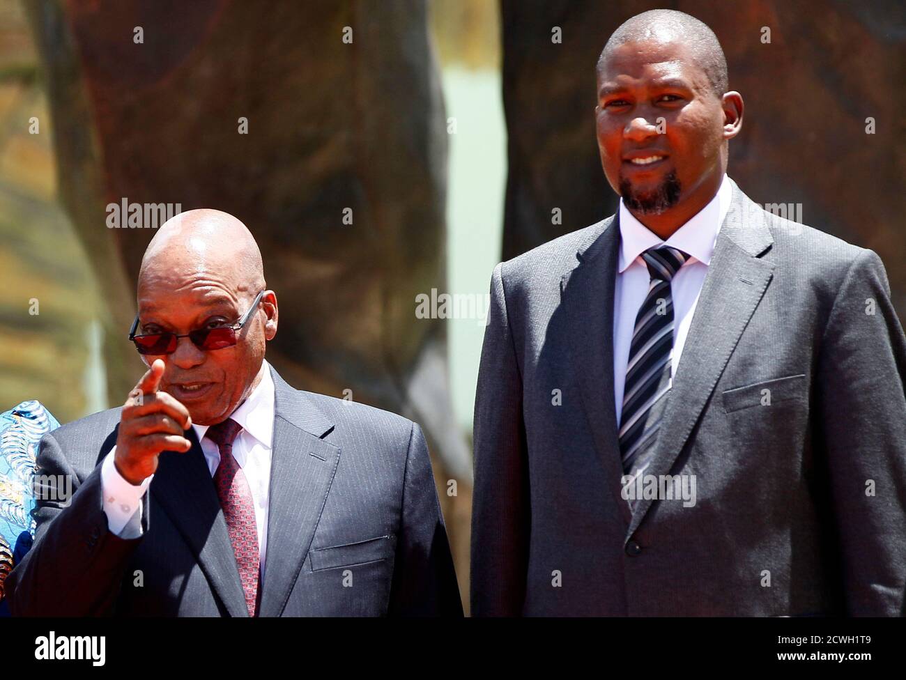 South Africa S President Jacob Zuma L Poses For A Photograph With Mandla Mandela Grandson Of The Late Former President Nelson Mandela After Unveiling A 9 Metre 30 Feet Bronze Statue Of Nelson Mandela As