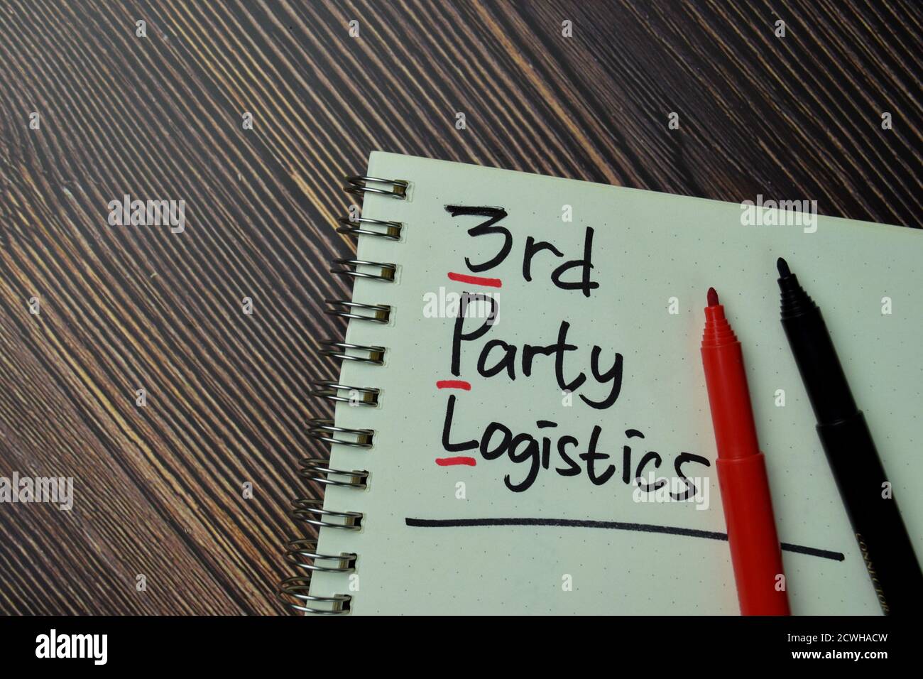 Logistique de tiers écrire sur un livre isolé sur le bureau. Banque D'Images