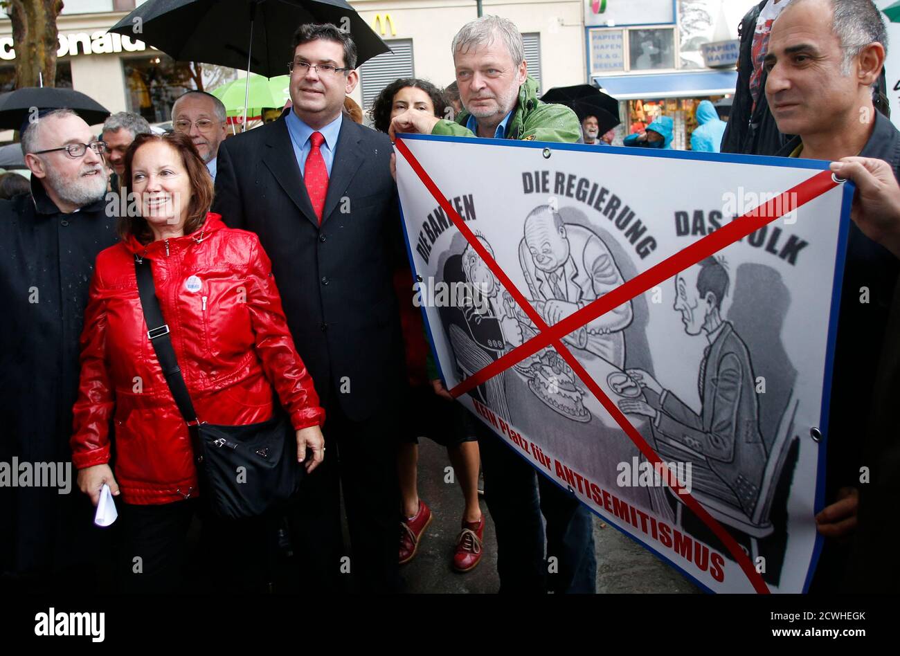 Rabbi Paul Chaim Eisenberg (L) and the President of the Jewish Community in  Austria Oskar Deutsch (3rdL) participate in a protest against anti-Semitism  in Vienna September 12, 2012. While Austria is one