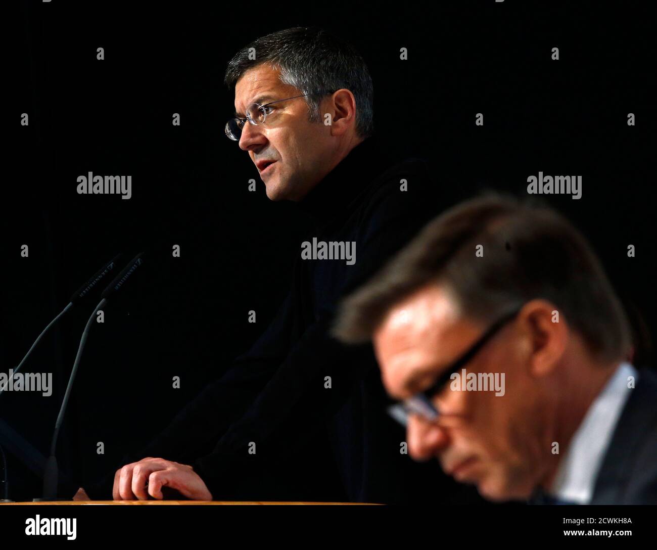 Herbert Hainer (L), chief executive officer of Adidas, the world's second  largest sports apparel firm, and Chief Financial Officer Robin Stalker  attend the company's annual news conference in Herzogenaurach March 7, 2013.