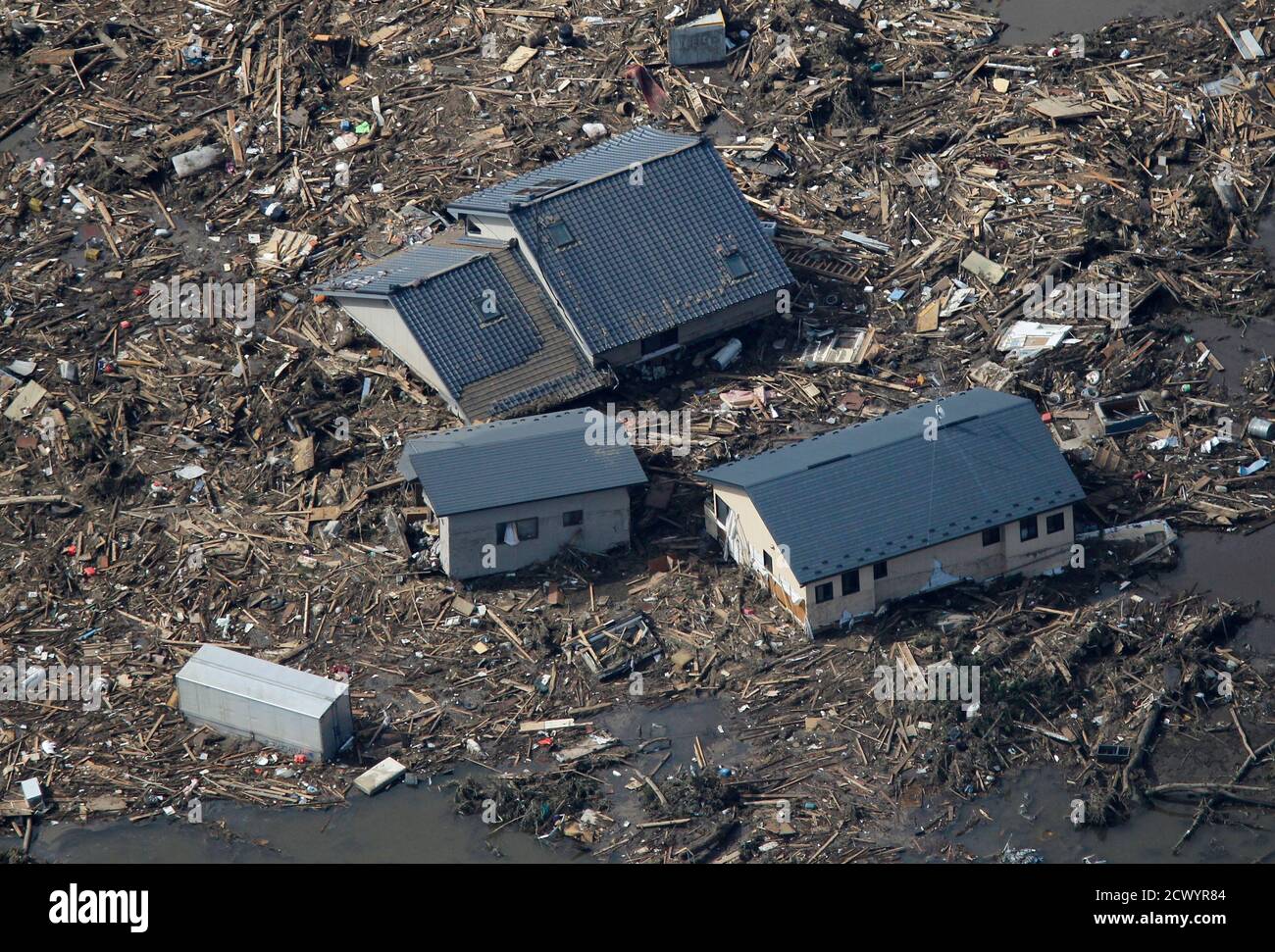 An Aerial View Of The Earthquake And Tsunami Damage At The Coastal Town Of Minami Soma March 12 11 Japan Confronted Devastation Along Its Northeastern Coast On Saturday With Fires Raging And