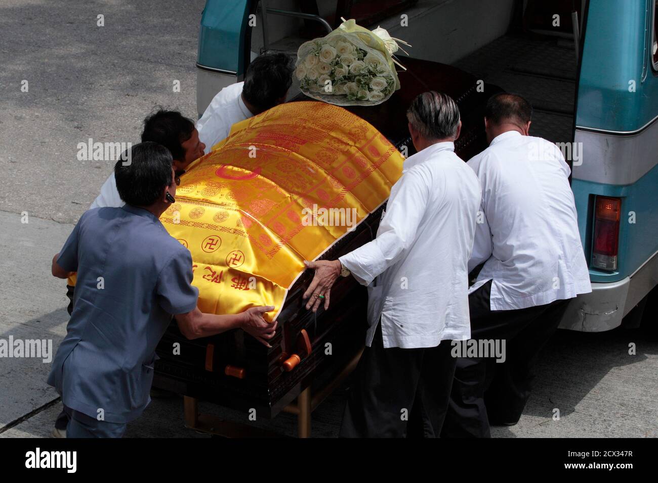 The Coffin Of Tour Guide Masa Tse Is Unloaded From A Van At A Crematorium During His Funeral In Hong Kong September 6 10 The Philippines National Police Chief Took The Blame