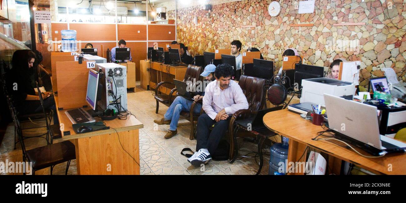 Customers use computers at an internet cafe in Tehran May 9, 2011. Websites  like Facebook, Twitter, YouTube and countless others were banned shortly  after the re-election of Iran's President Mahmoud Ahmadinejad and