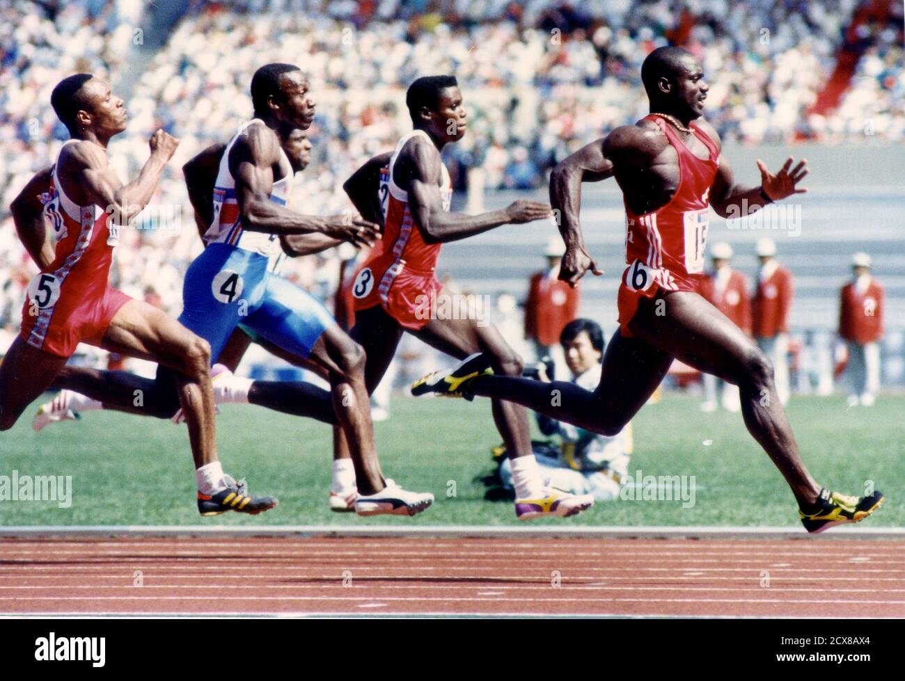 Ben Johnson of Canada (R) leads Calvin Smith of the U.S. (L), Linford  Christie of Britain (2nd L) and Carl Lewis of the U.S. to the finish line  to win the men's