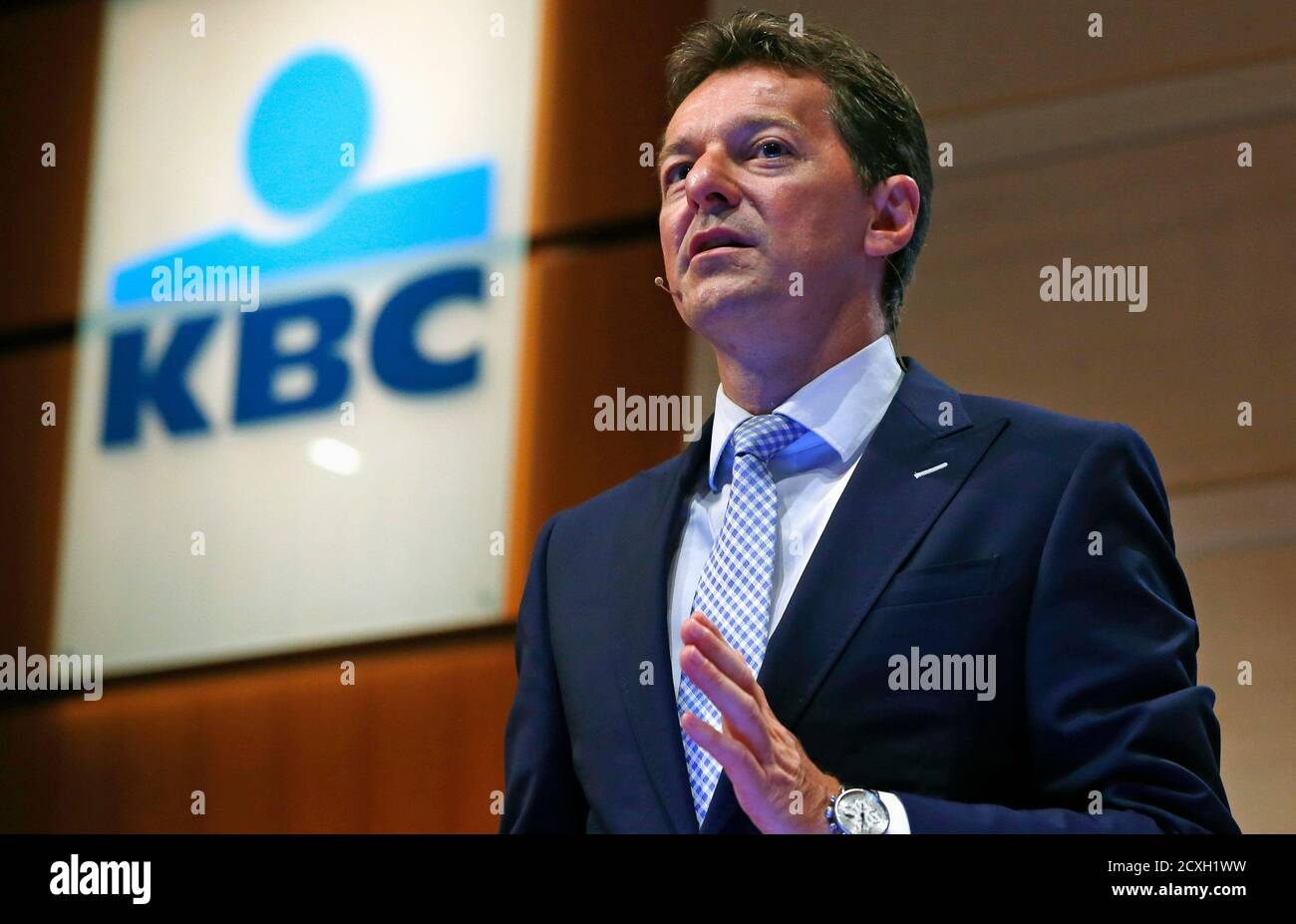 KBC Chief Executive Johan Thijs presents the Belgian financial group's 2014  second quarter results in Brussels August 7, 2014. Belgian financial group  KBC's profit fell by less than expected in the second