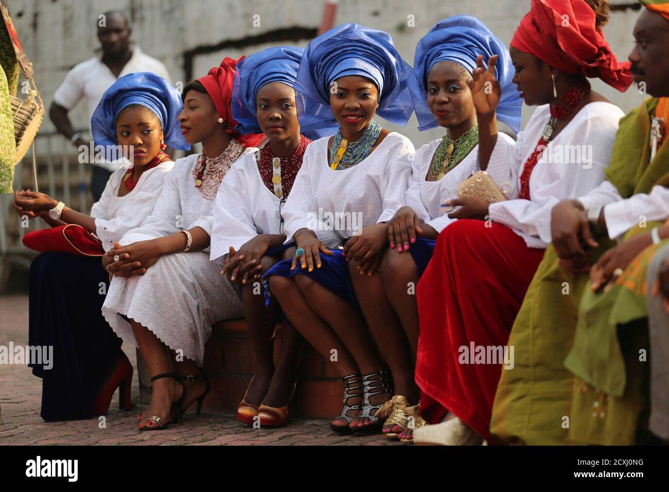 Cast members dressed in traditional attire perform in a scene during the  making of "Dazzling Mirage", directed by Tunde Kelani, at a film location  in Lagos December 19, 2013. Nigeria's movie business,