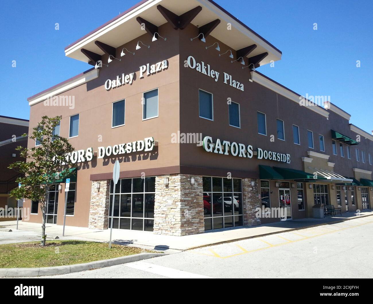 A Gator's Dockside restaurant, which is adding a surcharge onto diners'  bills for the Affordable Care Act, popularly known as Obamacare, is seen in  Clermont, Florida February 28, 2014. Diners at a