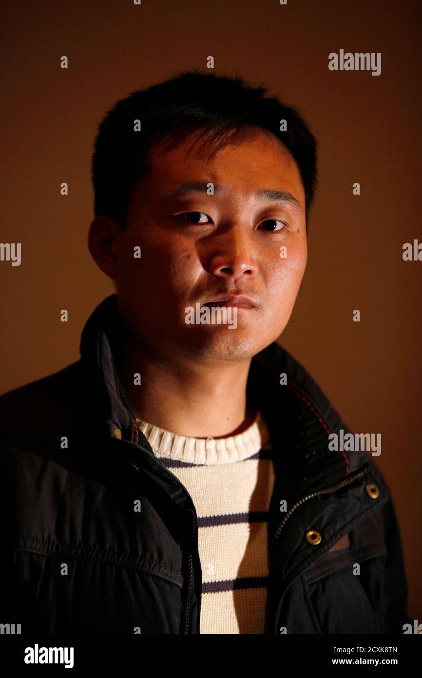 Jia Jingchuan, a 27-year-old production technician for Wintek, poses in a  cafe in Suzhou, Jiangsu province February 18, 2011. Jia is one of the  Chinese workers at a factory making touch screens