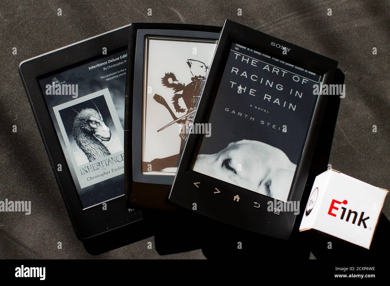 An Amazon Kindle (L-R), a Bookeen Cybook Odyssey, and a Sony Reader, all of  which use technology developed by E Ink, are pictured at E Ink Corporation  in Cambridge, Massachusetts October 25,