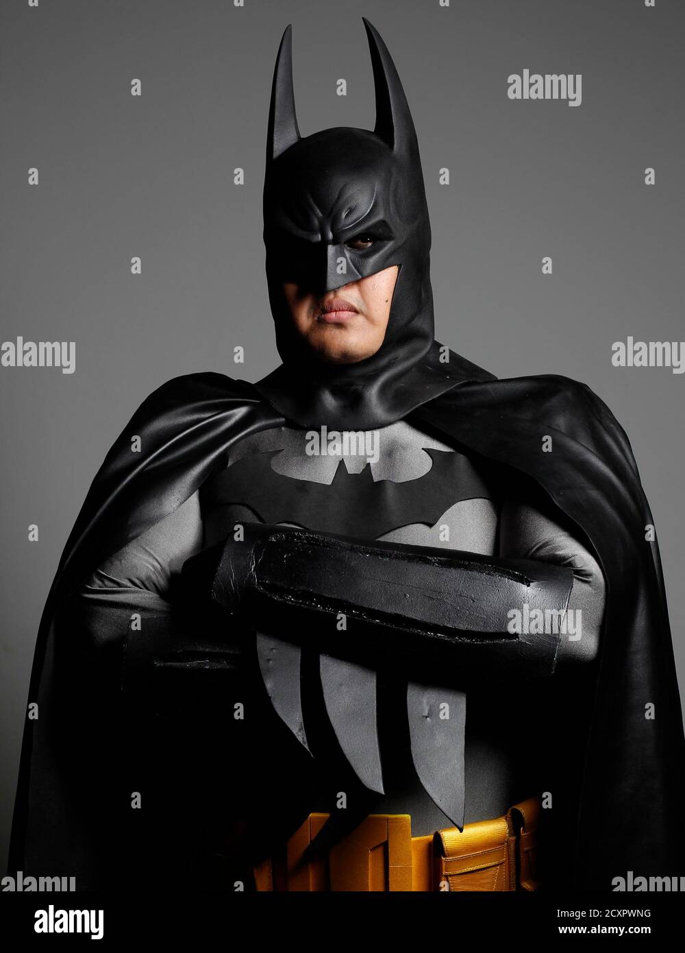 Un passionné de cosplay pose comme Batman au Singapore Toy, Game and Comic  Convention le 1er septembre 2013. La convention, qui compte 157 exposants  venus de 12 pays, est populaire auprès des