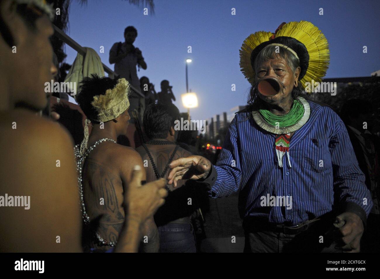 Cacique Raoni Metuktire R Chief Of The Kayapo Indian Tribe South Of The Amazon Basin Is Greeted By Munduruku Indians Who Are Occupying For The Second Day The Headquarters Of Brazil S Indian